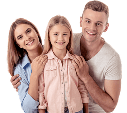 Father, mother, and daughter smiling and hugging